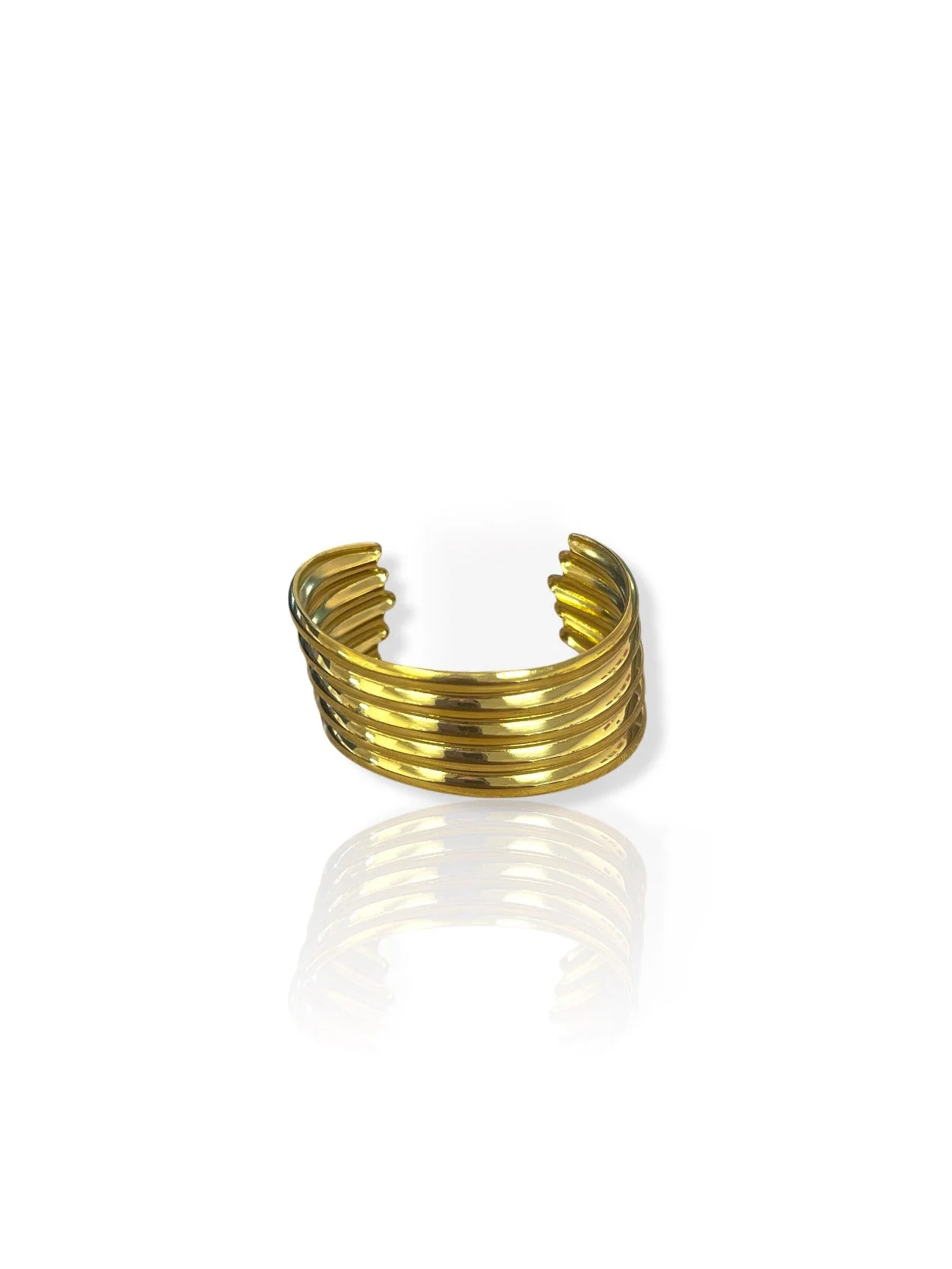 Brazalete aros asimétrico dorado
